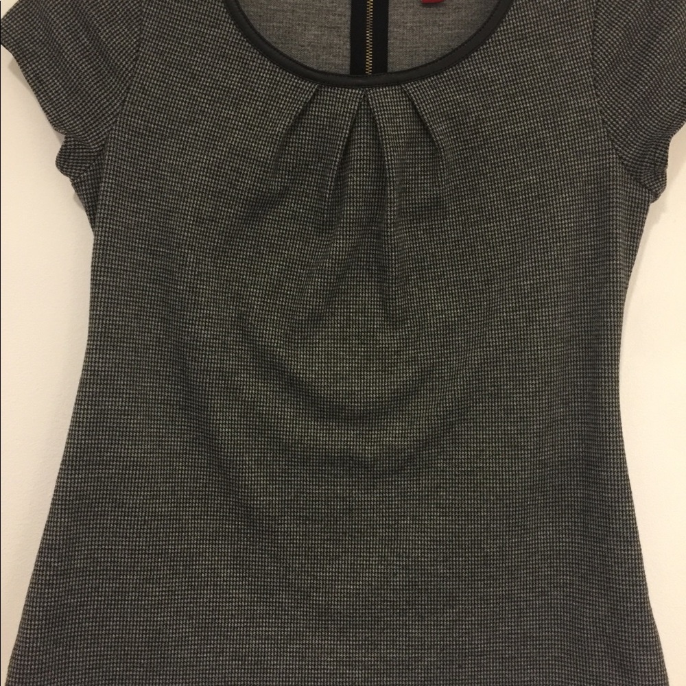 Cutest shirt...flattering to your shape.